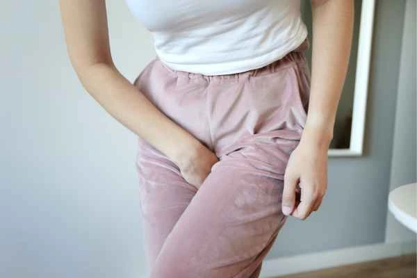 older woman running to the toilet because of urinary incontinence Swadlincote